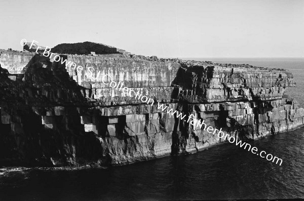 WAVES BREAKING ON CLIFFS